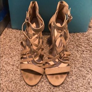 Crisscross strapped tan heels